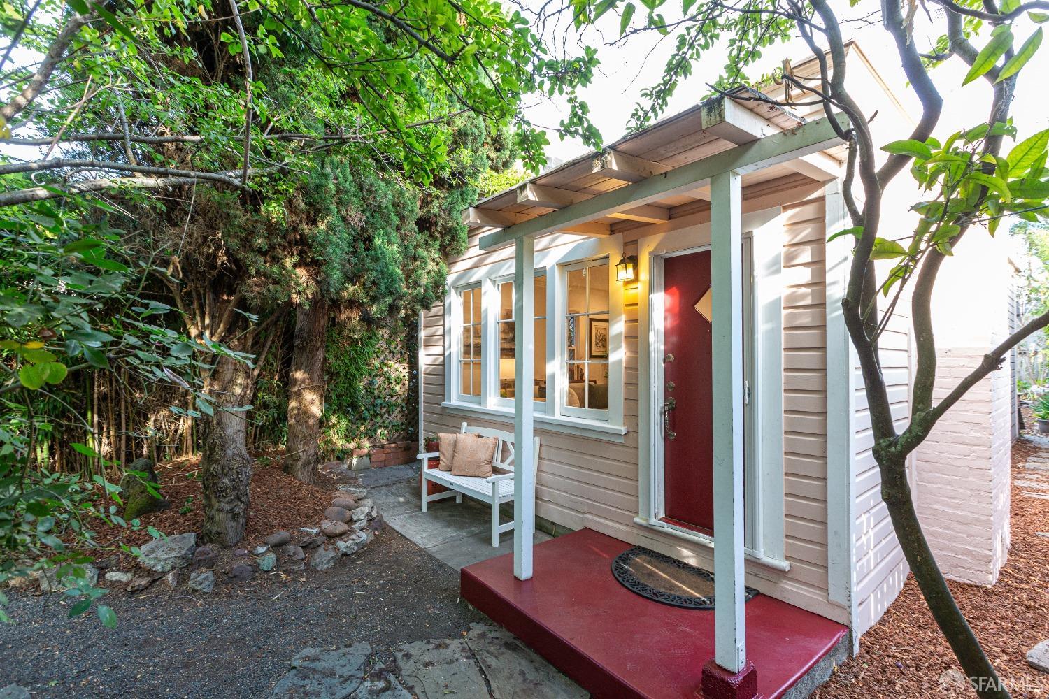 2410 Carleton Street Berkeley, CA 94704 - Photo 2 of 18 a house with trees in front of it