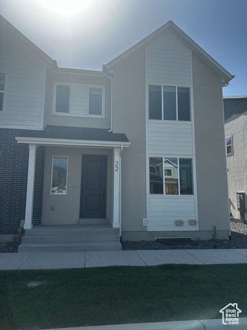 22 South Starlight Lane Mapleton, UT 84664 - Photo 1 of 17 View of front facade with stucco siding and a front lawn