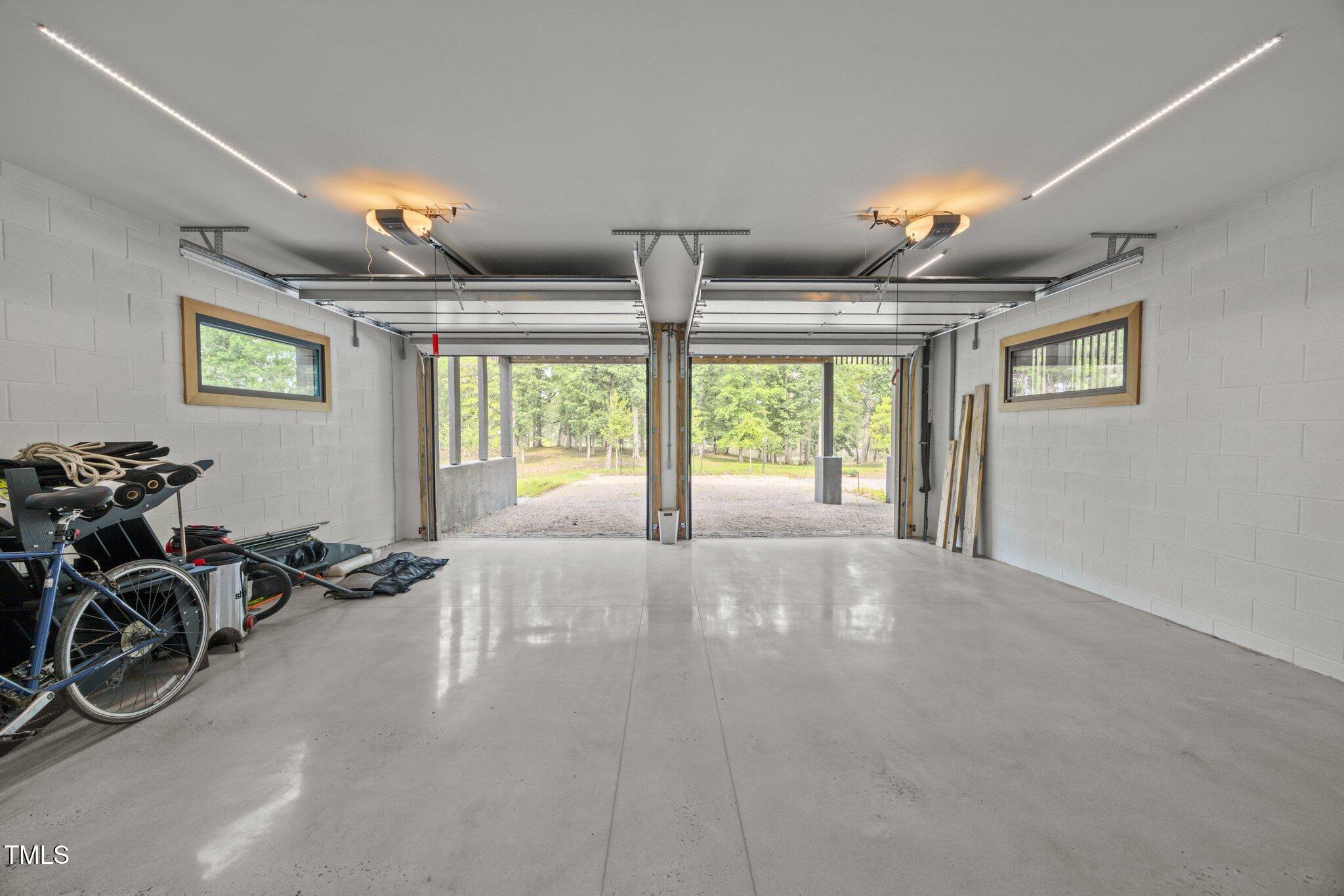 4725 Creeks Junction Road Blounts Creek, NC 27814 - Photo 13 of 42 a view of a livingroom with furniture and a window