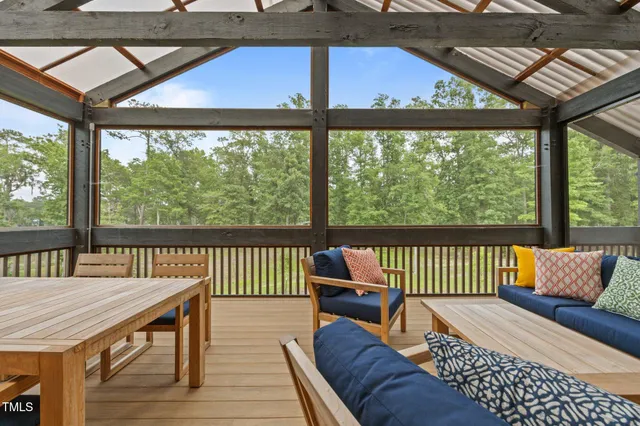 a view of balcony with furniture