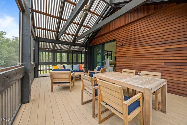 a patio with water table and chairs