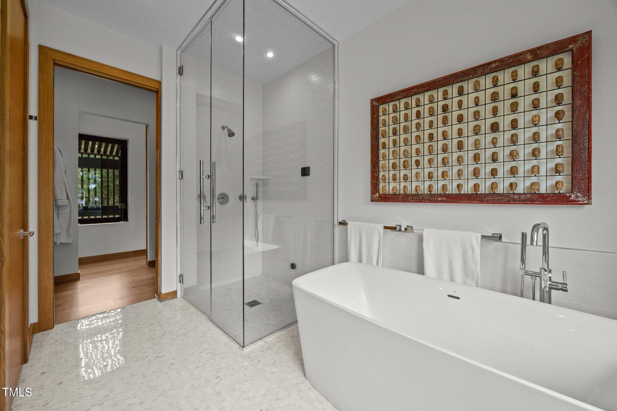 4725 Creeks Junction Road Blounts Creek, NC 27814 - Photo 30 of 42 a bathroom with a bathtub and a shower