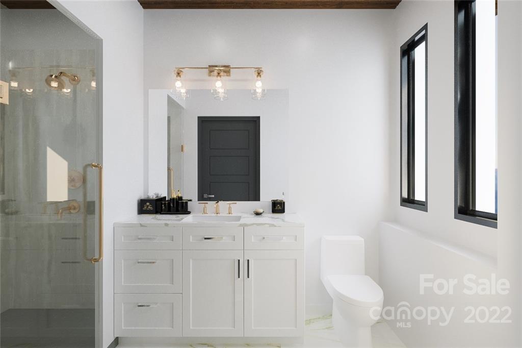 201 Grandin Road, Unit 7 Charlotte, NC 28208 - Photo 4 of 12 a bathroom with a sink toilet and shower