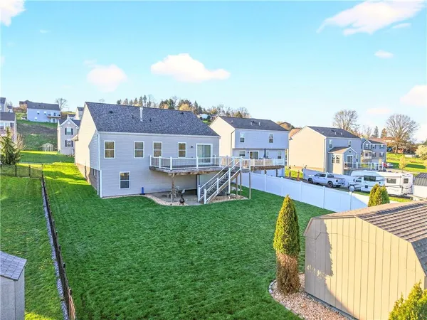 a view of a house with a big yard