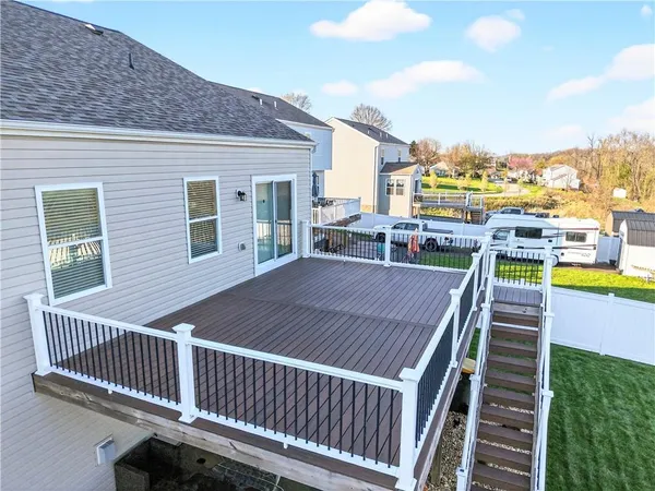 an aerial view of house with yard