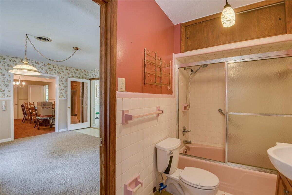 825 Brandy Road Aiken, SC 29801 - Photo 31 of 66 a bathroom with a toilet a sink and shower