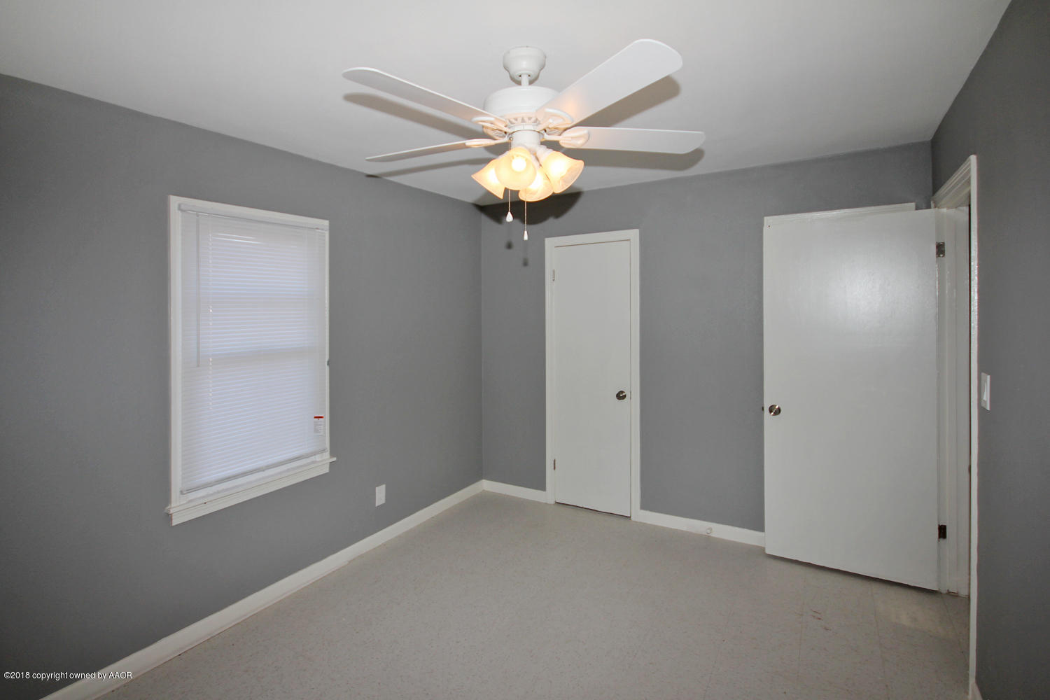 4214 South Travis Street Amarillo, TX 79110 - Photo 15 of 17 a view of a livingroom with a chandelier fan