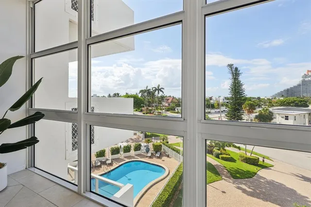 a view of a balcony with street view