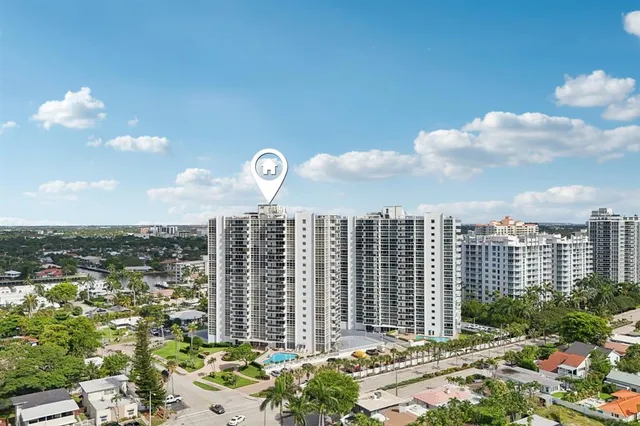a view of a city with tall buildings