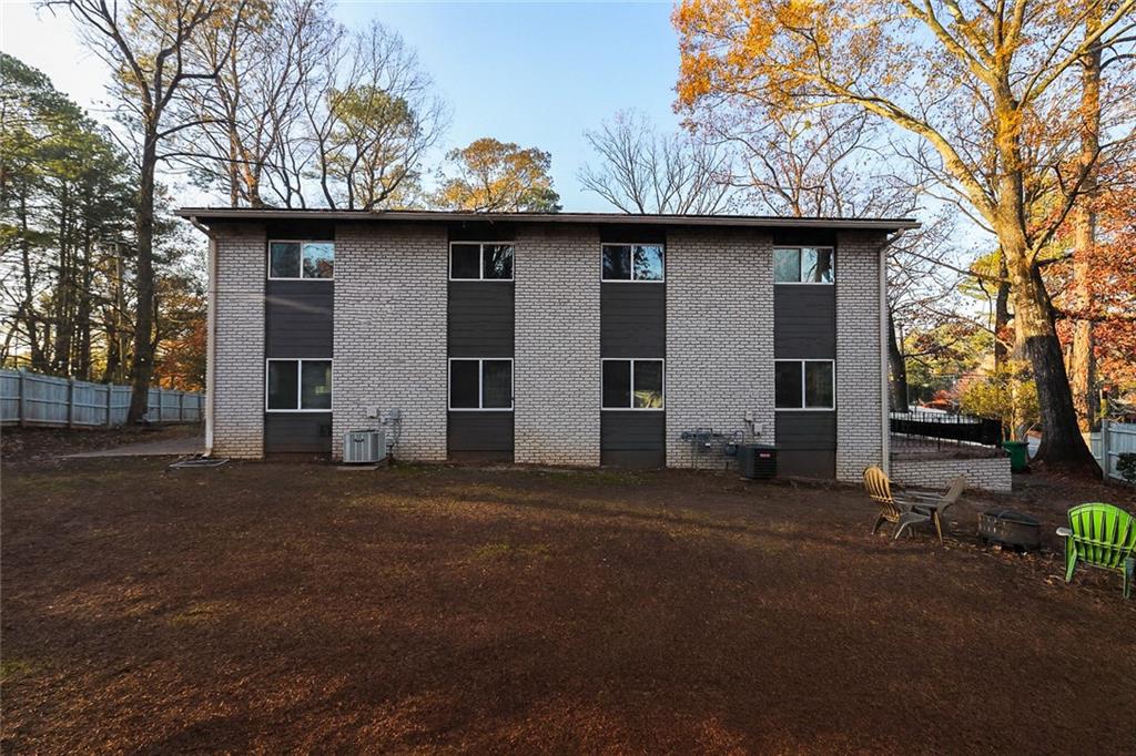 1277 Goodwin Road Northeast, Unit 1271 Atlanta, GA 30324 - Photo 17 of 19 a view of a house with a outdoor space