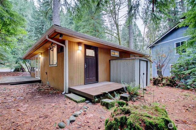 a backyard of a house with seating space