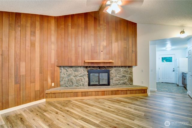 a view of a livingroom with wooden floor