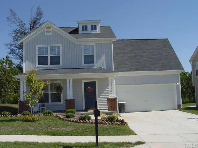 3729 Hopper Street Raleigh, NC 27616 - Photo 1 of 1 a front view of a house with garden
