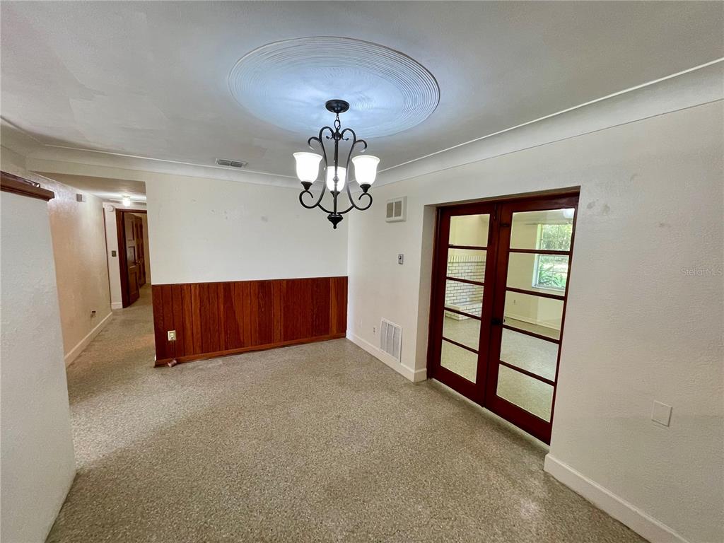 206 Robin Road Altamonte Springs, FL 32701 - Photo 20 of 36 an empty room with windows and entrance