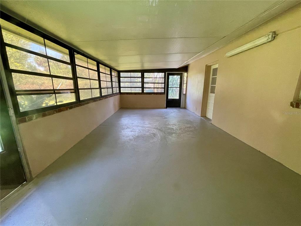 206 Robin Road Altamonte Springs, FL 32701 - Photo 23 of 36 a view of an empty room with a window