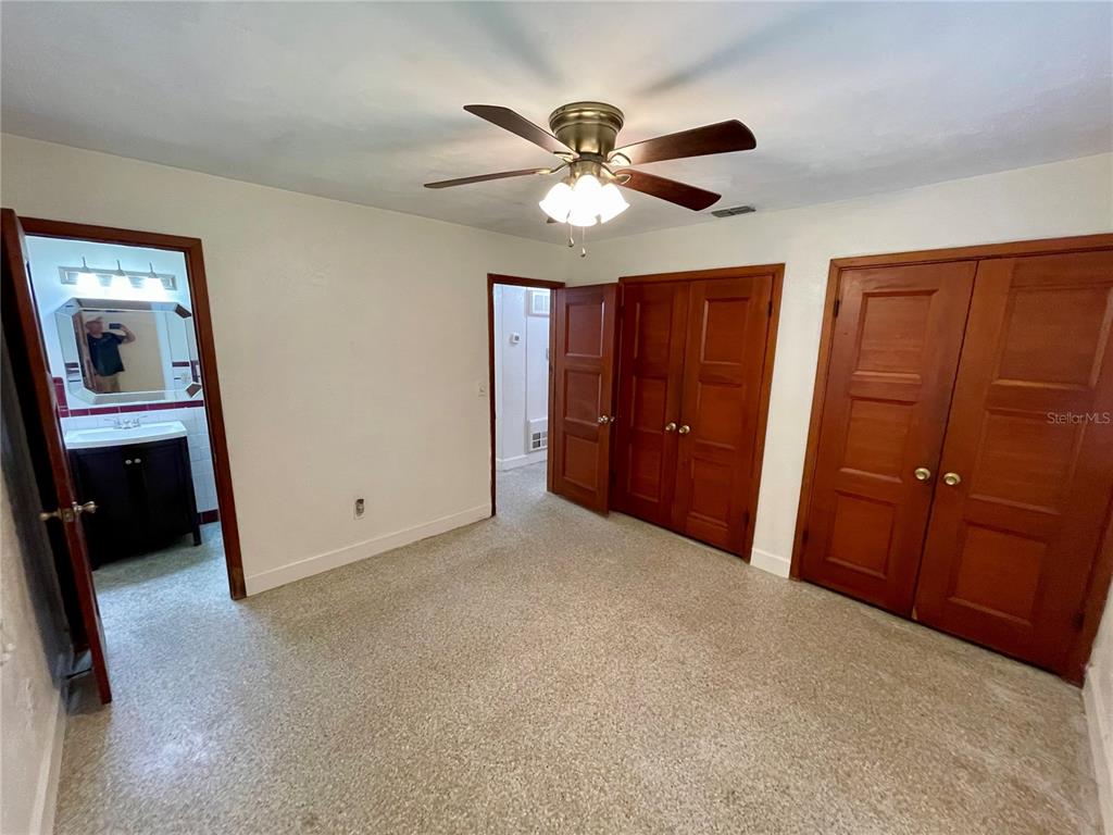206 Robin Road Altamonte Springs, FL 32701 - Photo 27 of 36 a view of a livingroom with a fan