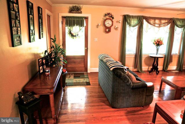2122 Fallston Road Fallston, MD 21047 - Photo 7 of 30 a balcony with furniture and wooden floor