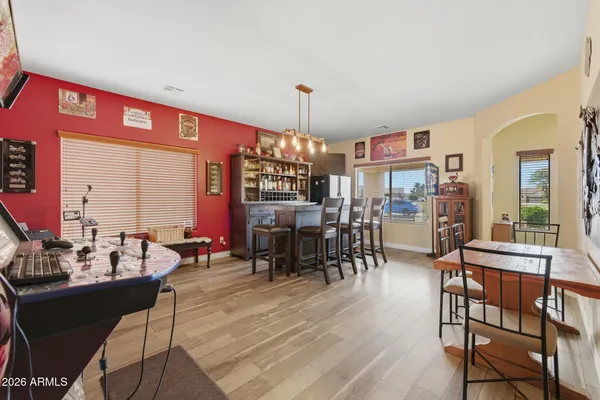 a view of a dining room with furniture window and outside view