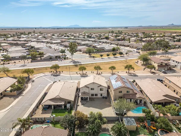 an aerial view of residential building with parking space