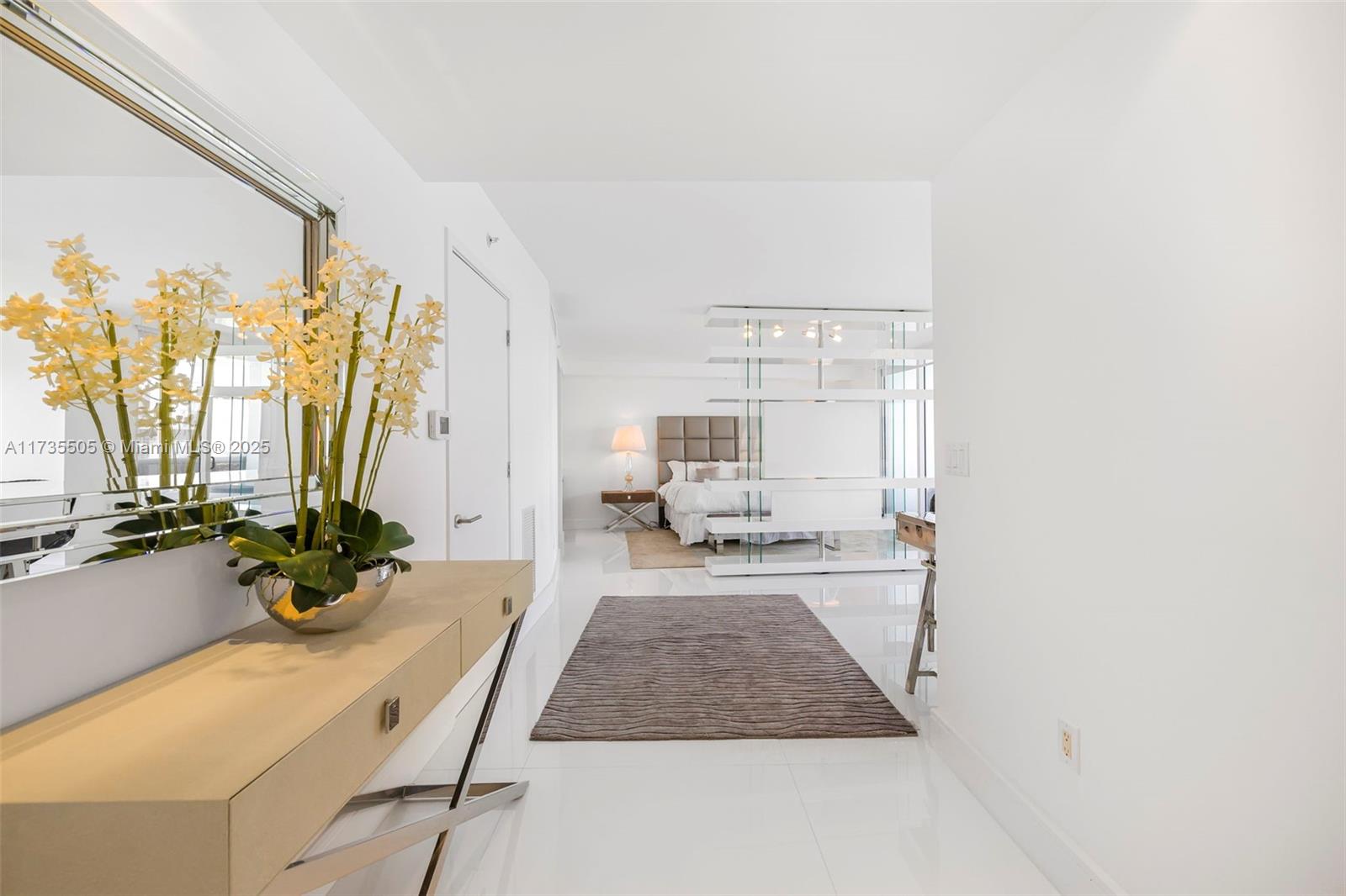 18201 Collins Avenue, Unit PH5109 Sunny Isles Beach, FL 33160 - Photo 31 of 53 a very nice looking room with a large window