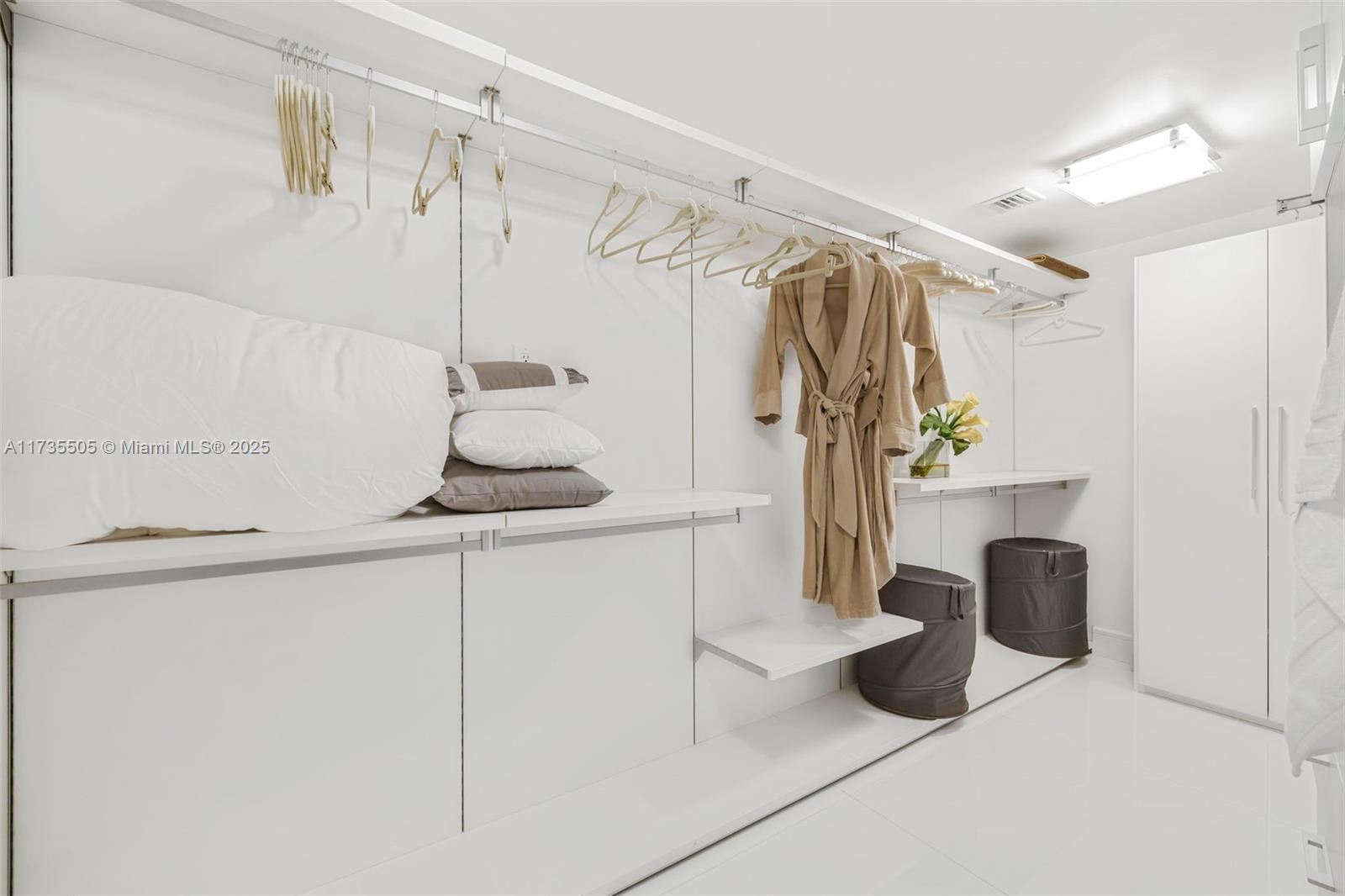 18201 Collins Avenue, Unit PH5109 Sunny Isles Beach, FL 33160 - Photo 37 of 53 a bathroom with a sink and a shower