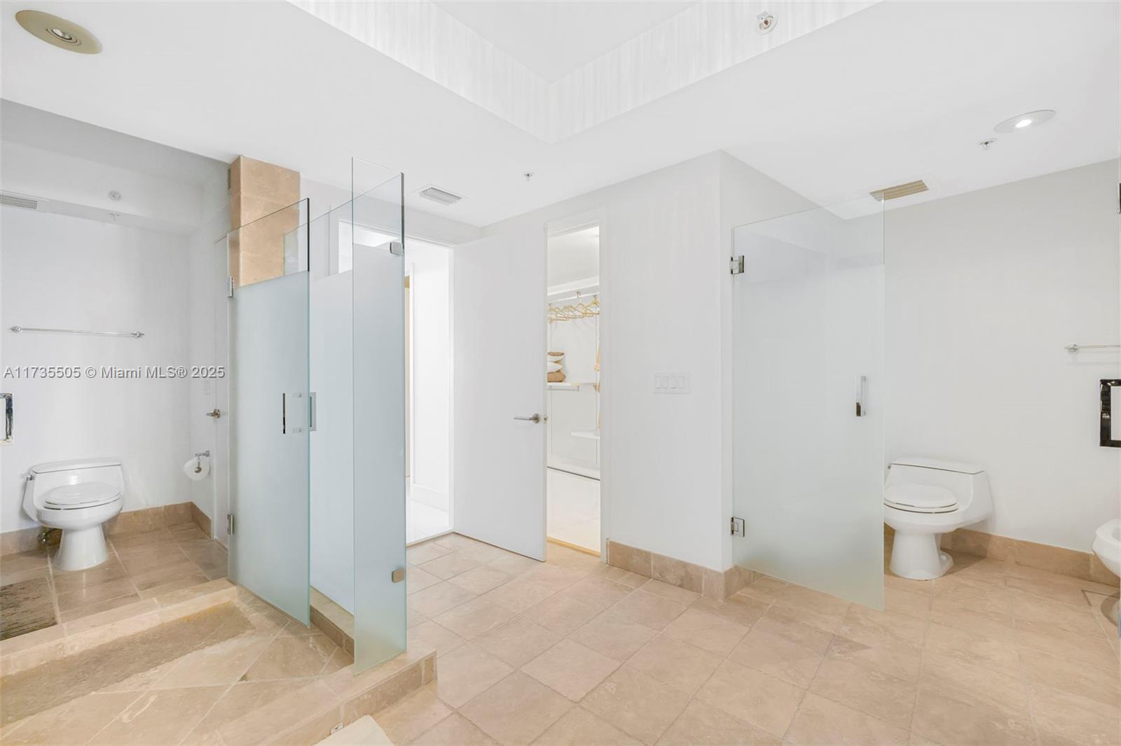 18201 Collins Avenue, Unit PH5109 Sunny Isles Beach, FL 33160 - Photo 41 of 53 a bathroom with a sink toilet and shower