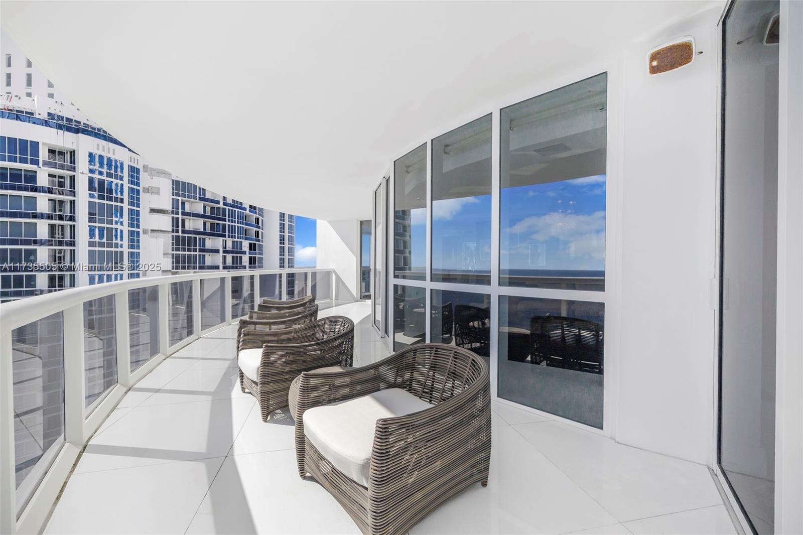 18201 Collins Avenue, Unit PH5109 Sunny Isles Beach, FL 33160 - Photo 45 of 53 a living room with furniture