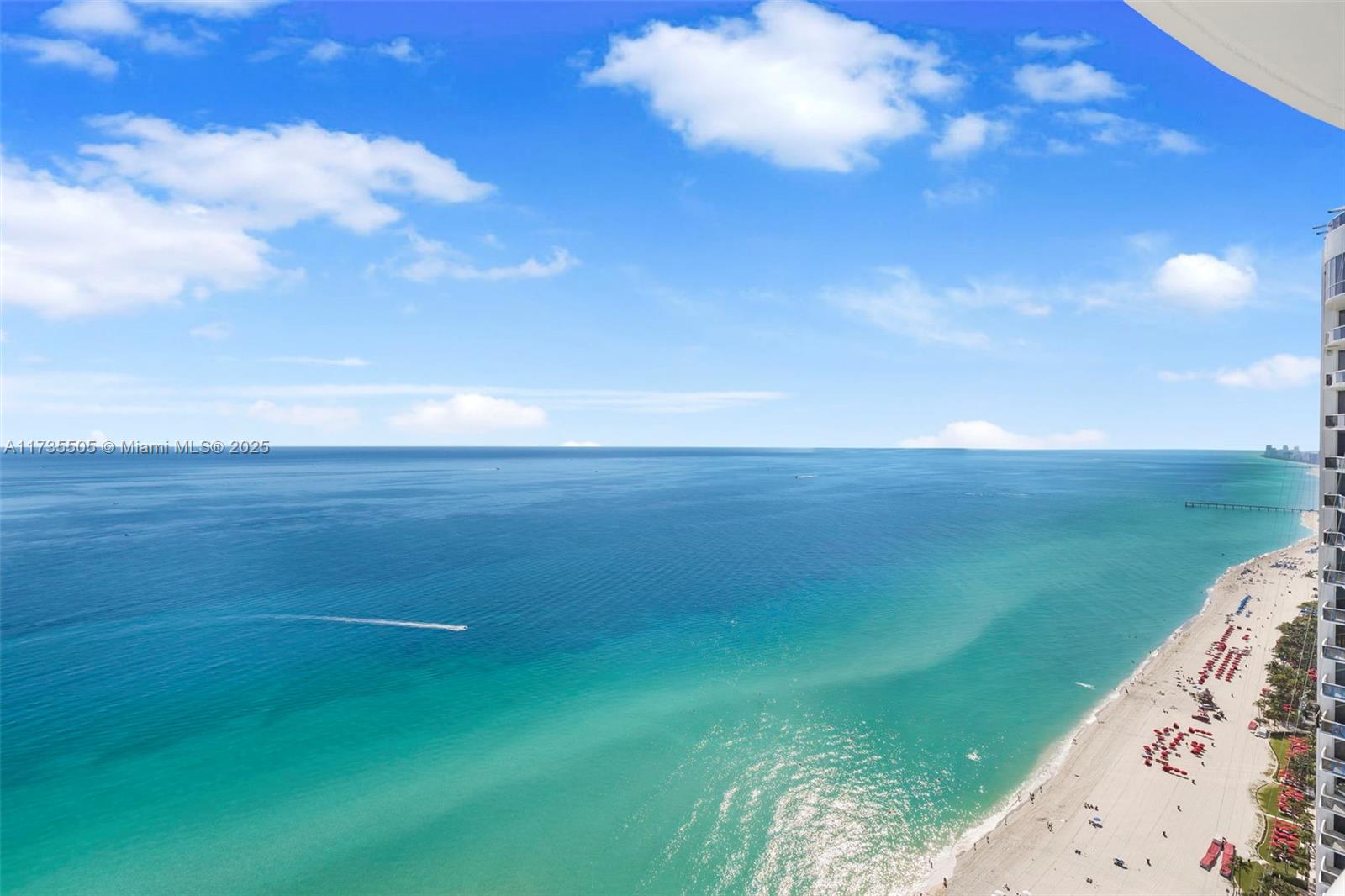 18201 Collins Avenue, Unit PH5109 Sunny Isles Beach, FL 33160 - Photo 49 of 53 a view of a lake with a big yard