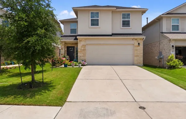 a front view of house with yard
