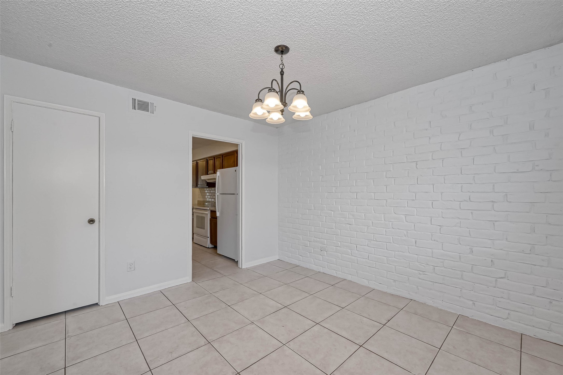 14179 Misty Meadow Lane Houston, TX 77079 - Photo 23 of 41 a view of a chandelier in big room and chandelier fan