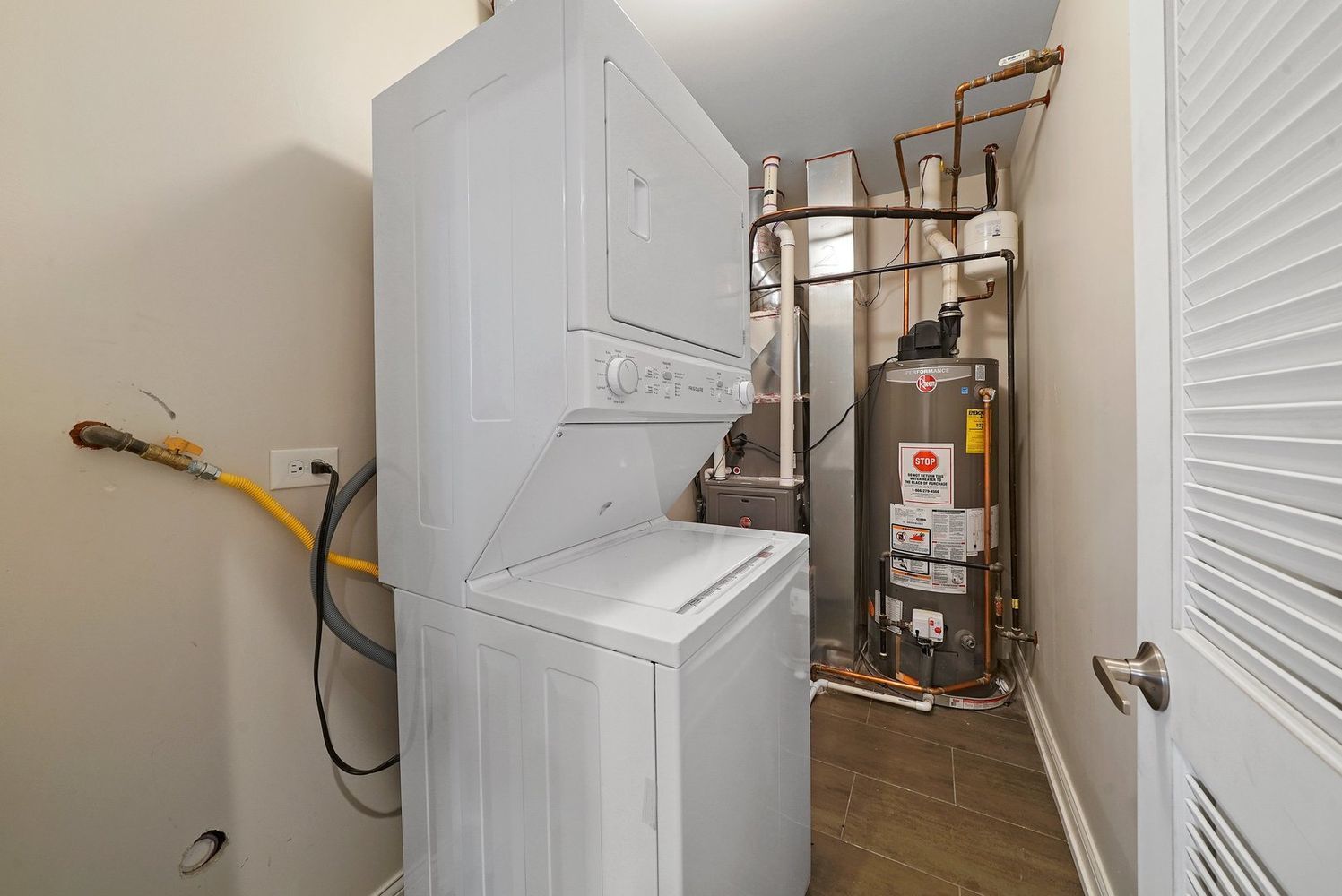1946 South Racine Avenue, Unit 2R Chicago, IL 60608 - Photo 12 of 12 a utility room with dryer and washer