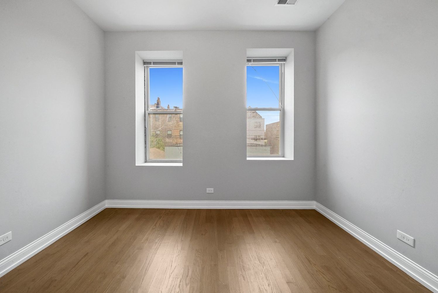 1946 South Racine Avenue, Unit 2R Chicago, IL 60608 - Photo 8 of 12 an empty room with a window