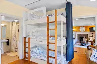 a bathroom with a tub and shower