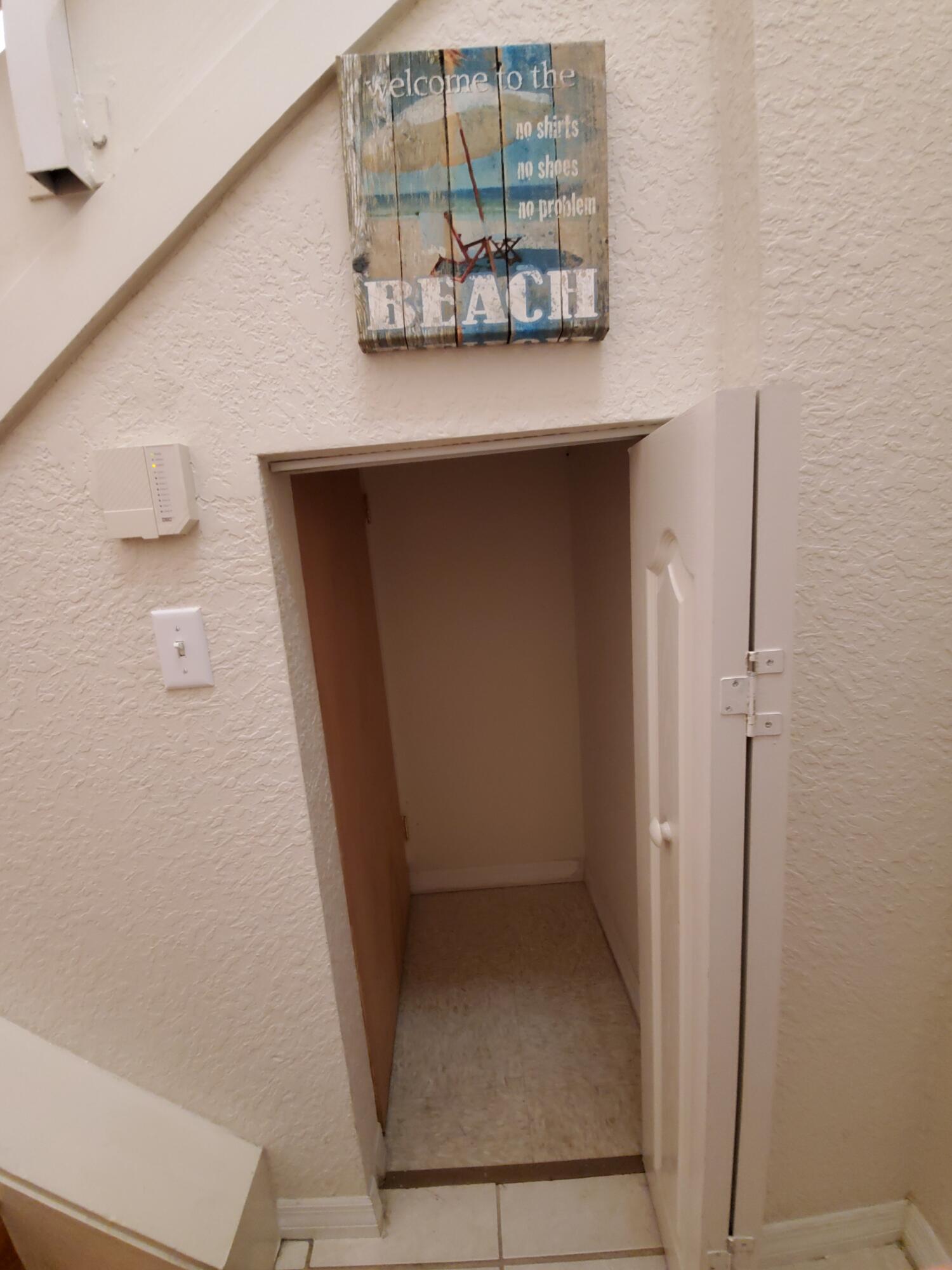 11019 Legacy Lane, Unit 305 Palm Beach Gardens, FL 33410 - Photo 23 of 40 Storage under stairway