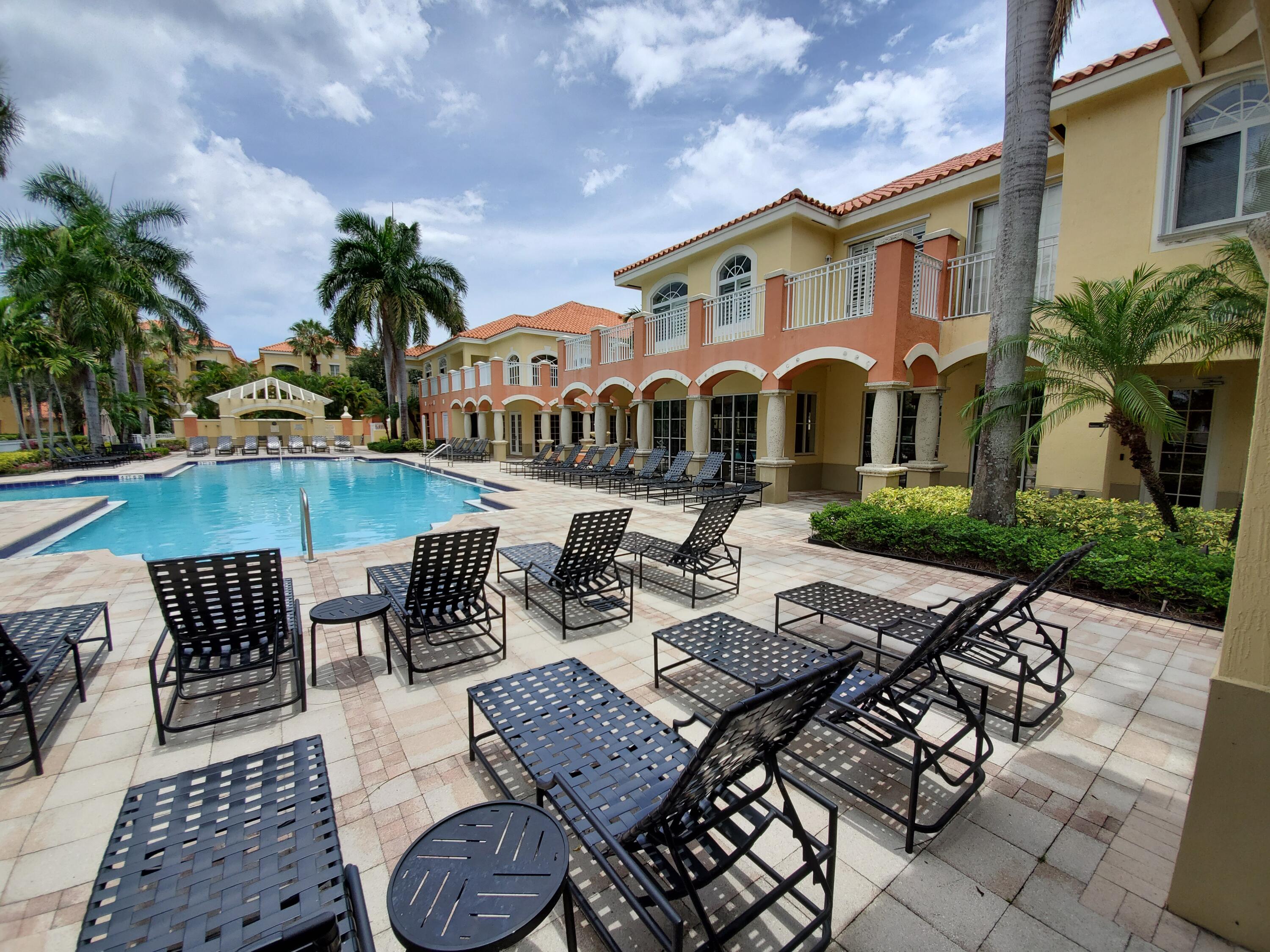 11019 Legacy Lane, Unit 305 Palm Beach Gardens, FL 33410 - Photo 30 of 40 Pool deck