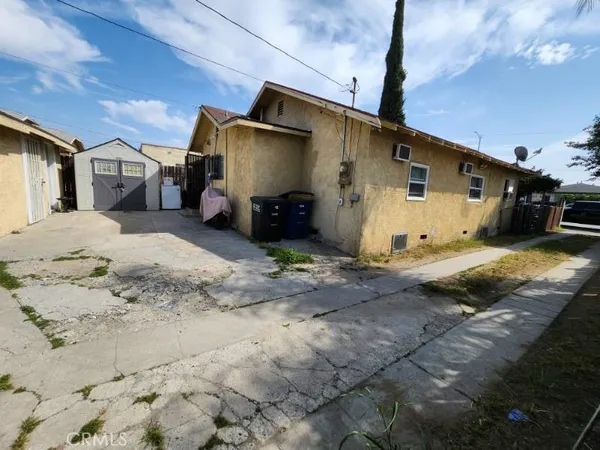 a view of a house with a patio