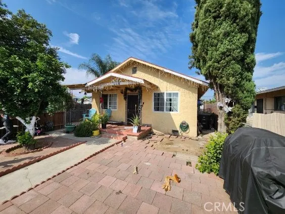 a front view of a house with patio