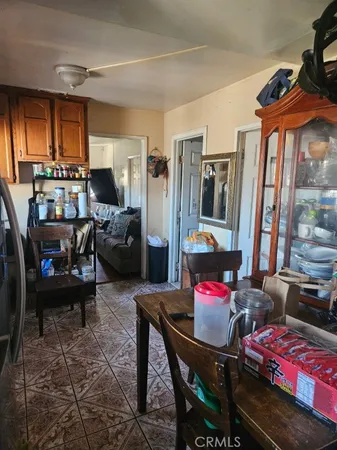 a room with furniture a washer and dryer