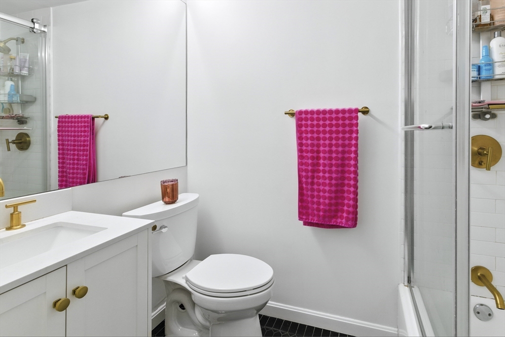 3 Post Oak Lane, Unit 1 Natick, MA 01760 - Photo 9 of 13 a bathroom with a sink toilet and shower