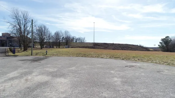 a terrace with a table and chairs