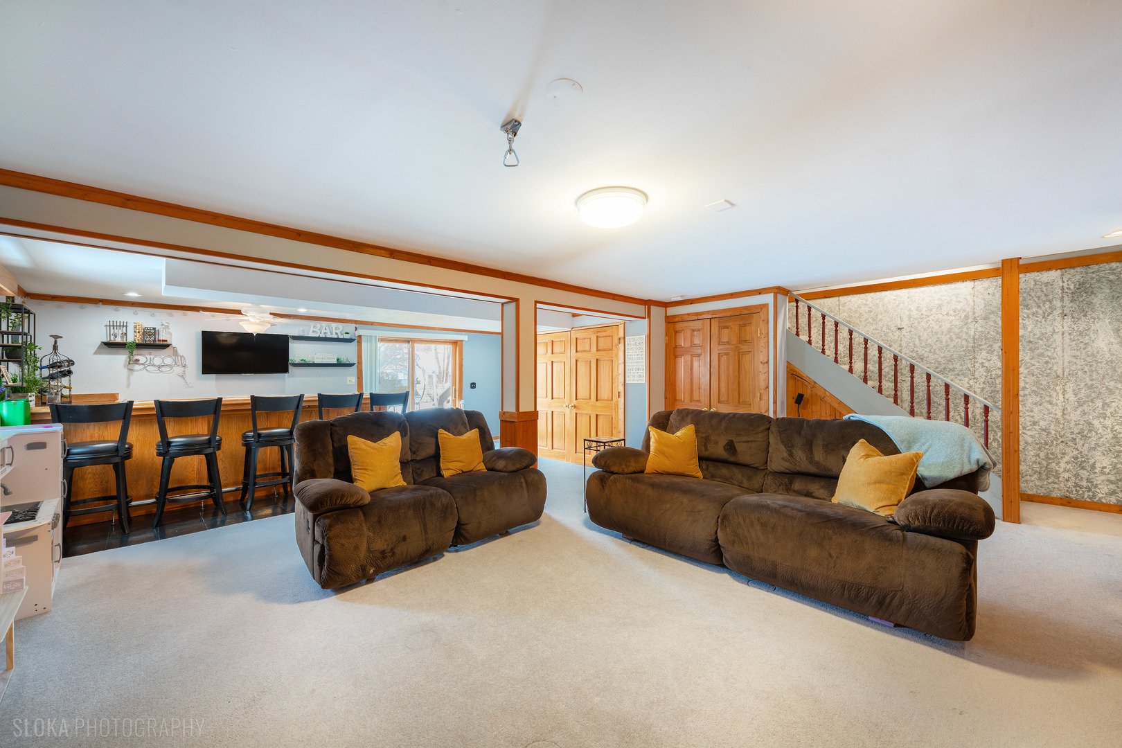 1259 Chickory Ridge Trail Cary, IL 60013 - Photo 21 of 31 a living room with furniture and a flat screen tv
