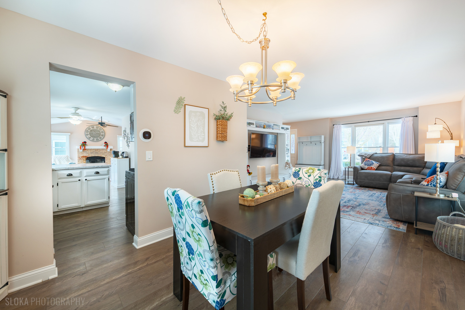 1259 Chickory Ridge Trail Cary, IL 60013 - Photo 4 of 31 a view of a dining room with furniture wooden floor and chandelier