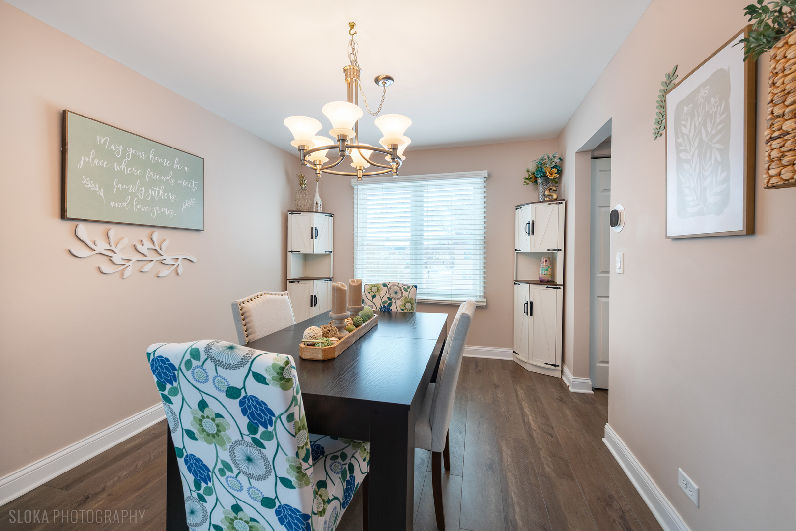 1259 Chickory Ridge Trail Cary, IL 60013 - Photo 5 of 31 a view of a dining room with furniture wooden floor and chandelier