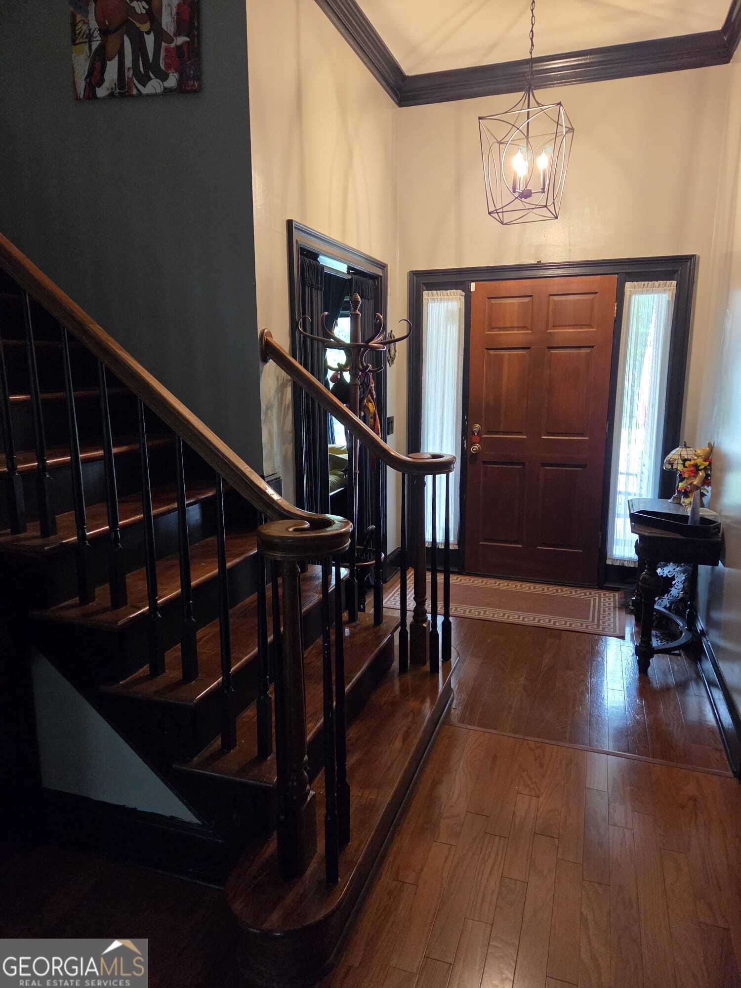 3175 Stinsonville Road Macon, GA 31204 - Photo 11 of 13 a view of entryway and hall with wooden floor