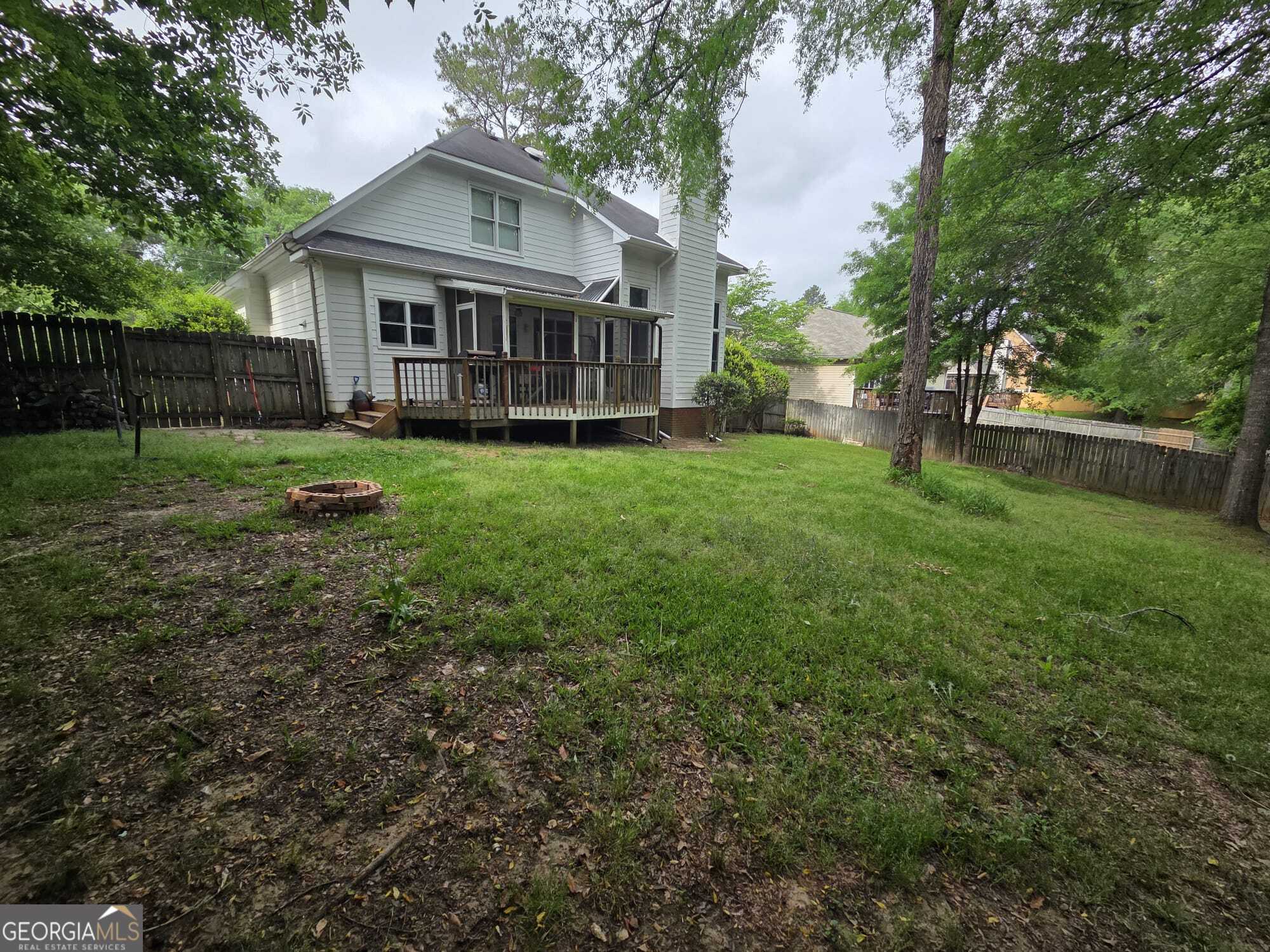 3175 Stinsonville Road Macon, GA 31204 - Photo 2 of 13 a view of a house with yard and sitting area