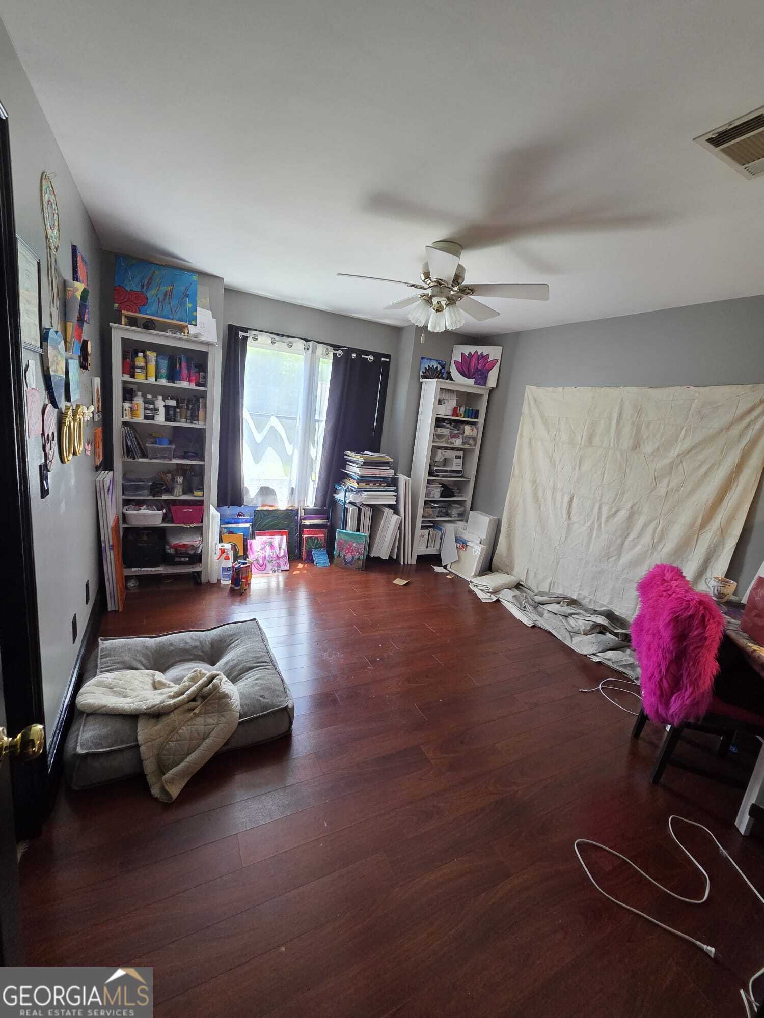 3175 Stinsonville Road Macon, GA 31204 - Photo 7 of 13 a living room with furniture and a flat screen tv