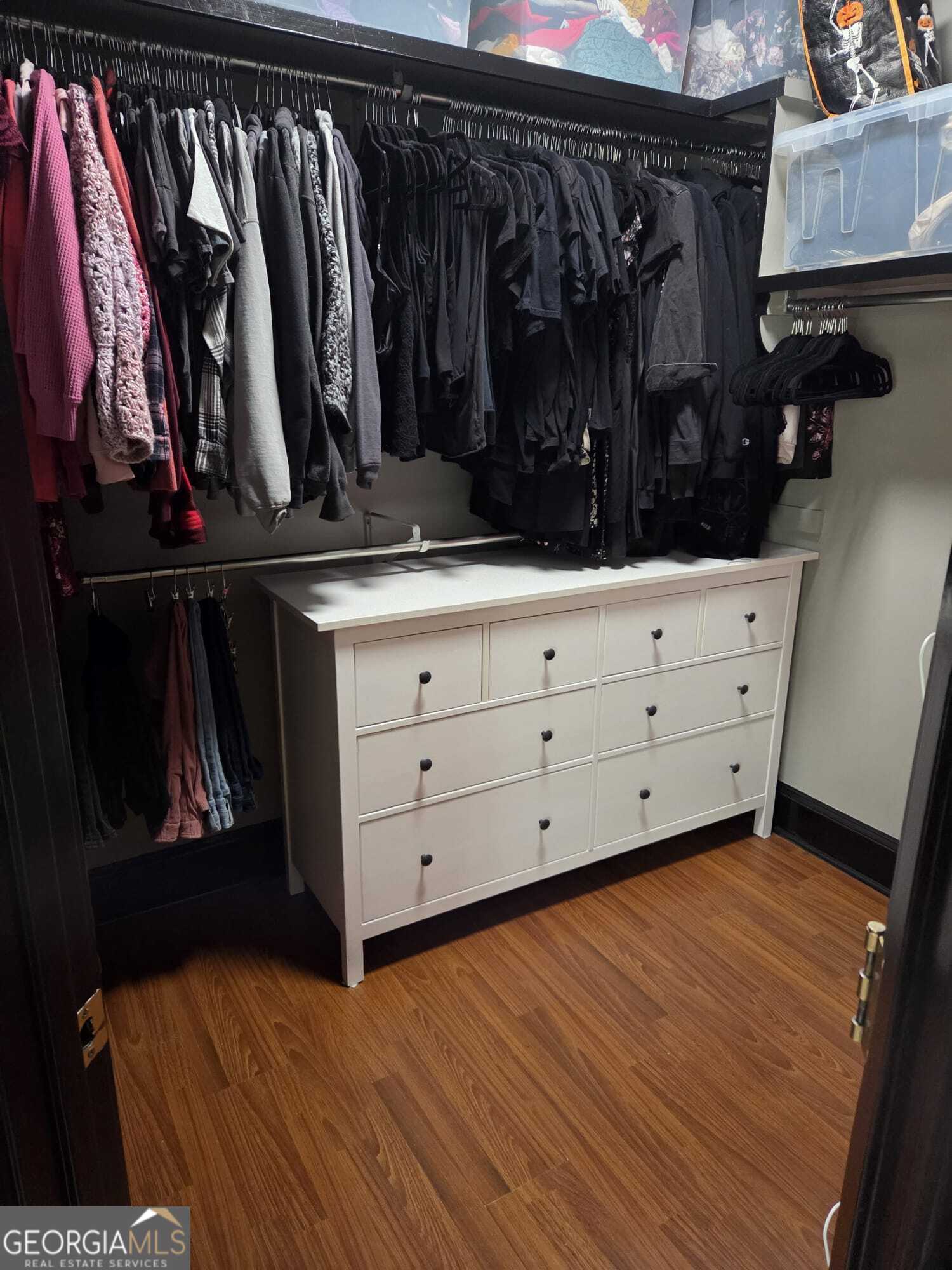 3175 Stinsonville Road Macon, GA 31204 - Photo 9 of 13 a view of walk in closet with clothes and shoes