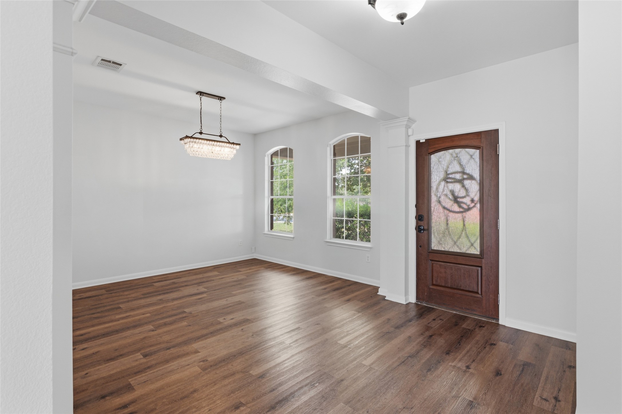 1271 Stone Rim Loop Buda, TX 78610 - Photo 5 of 40 FORMAL DINING AREA WITH UPGRADED LIGHT FIXTURE