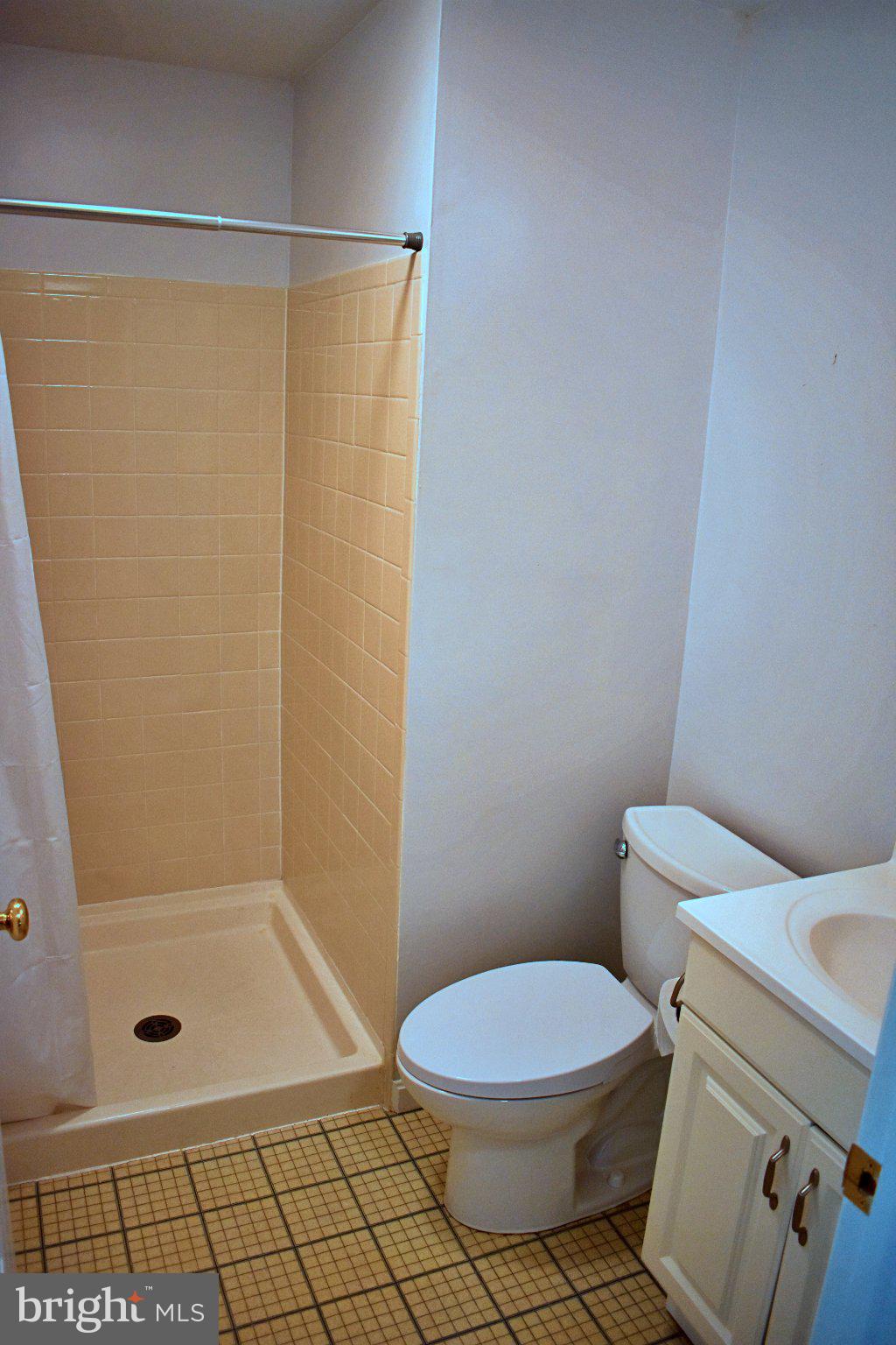 8097 Winding Way Court Springfield, VA 22153 - Photo 23 of 44 Compact and functional bathroom space.