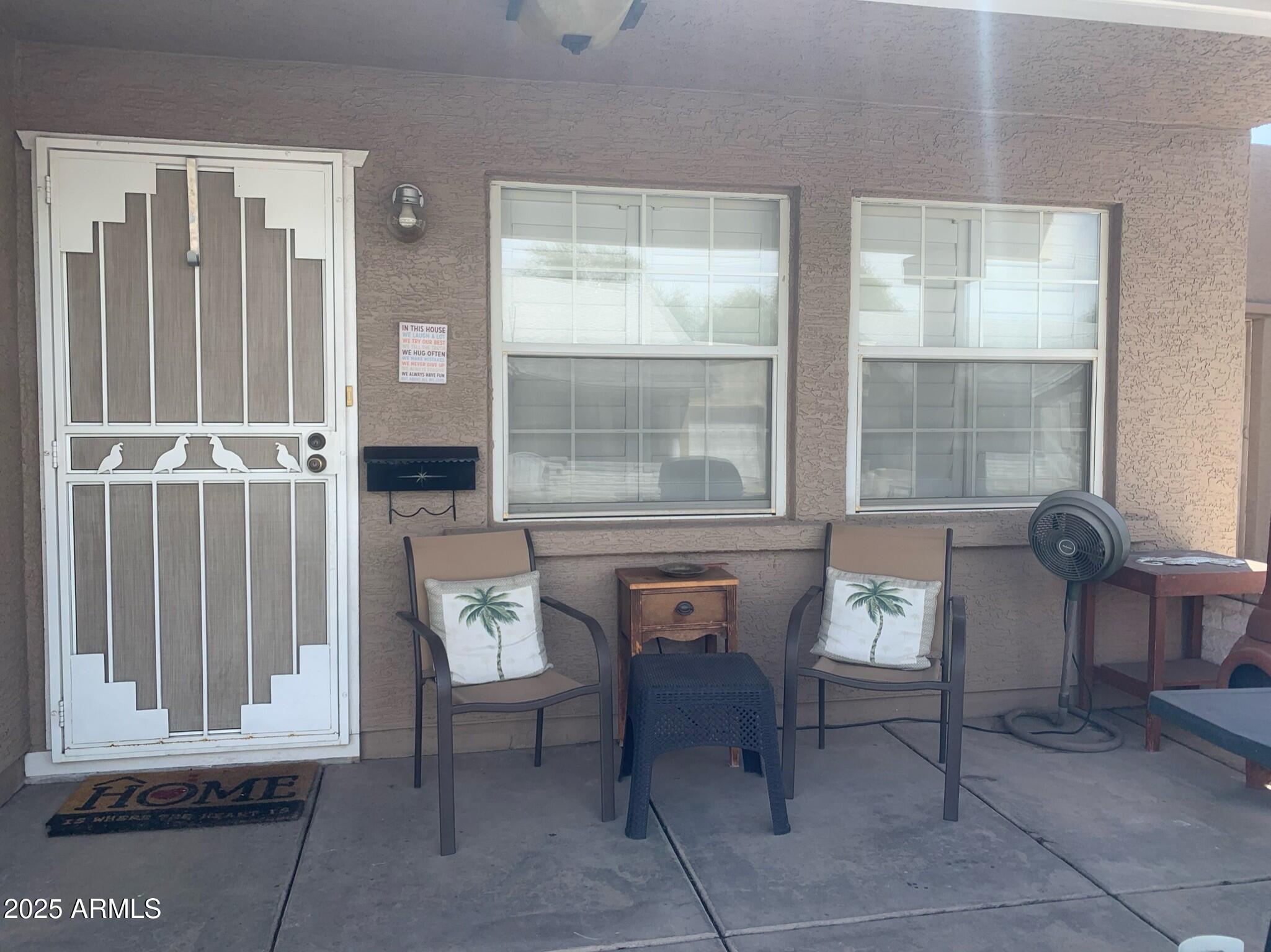 2929 East Broadway Road, Unit 102 Mesa, AZ 85204 - Photo 1 of 16 a dining room with furniture and a window